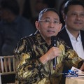 Wakil Ketua Umum I Asosiasi Jasa Pertambangan Indonesia, Ahmad Kharis menyampaikan pemaparan dalam acara EV Transition in Mining Industry Outlook 2026 di Jakarta, Rabu (29/4/2026). (CNBC Indonesia/Tri Susilo)