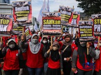 Massa buruh yang tergabung dalam Gerakan Serikat Pekerja Manufaktur Independen Indonesia (GSPMII) melakukan unjuk rasa saat peringatan Hari Buruh Internasional atau May Day di kawasan Patung Kuda, Jakarta, Kamis (1/5/2026). (CNBC Indonesia/Faisal Ra