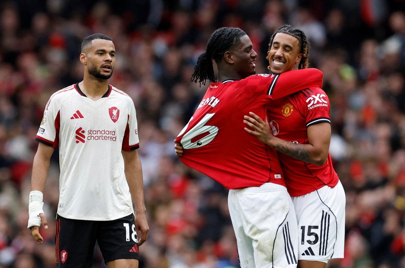 MU menaklukkan Liverpool dalam laga pekan ke-35 Premier League yang digelar di Old Trafford, Minggu (3/5/2026) malam WIB. Setan Merah memenangi pertandingan dengan skor 3-2. (Action Images via Reuters/Jason Cairnduff)