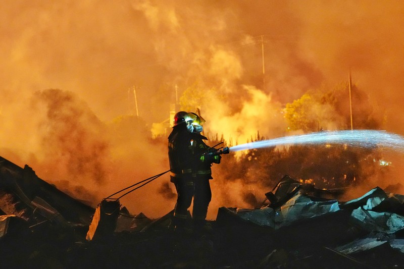 Firefighters work to extinguish a fire following a blast at a fireworks manufacturing factory in Liuyang, Hunan province, China, May 5, 2026. cnsphoto via REUTERS   ATTENTION EDITORS - THIS IMAGE WAS PROVIDED BY A THIRD PARTY. CHINA OUT.      TPX IMAGES OF THE DAY