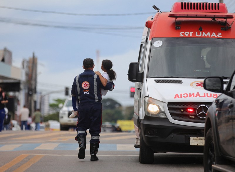Policemen patrol after a shooting at a Sao Jose school, where two staff members were killed, the Acre state government confirmed in a statement, in Rio Branco, Brazil, May 5, 2026. REUTERS/Sergio Vale