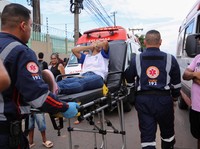 Emergency responders carry a student after a shooting at a Sao Jose school, where two staff members were killed, the Acre state government confirmed in a statement. in Rio Branco, Brazil, May 5, 2026. REUTERS/Sergio Vale