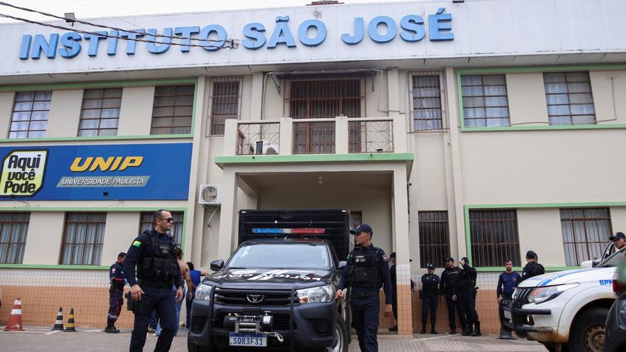 Policemen patrol after a shooting at a Sao Jose school, where two staff members were killed, the Acre state government confirmed in a statement, in Rio Branco, Brazil, May 5, 2026. REUTERS/Sergio Vale