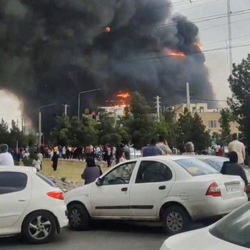 Flames and smoke rise after a fire broke out at a shopping center in Tehran, Iran, May 5, 2026, in this screen grab taken from social media video. SOCIAL MEDIA/via REUTERS  THIS IMAGE HAS BEEN SUPPLIED BY A THIRD PARTY. NO RESALES. NO ARCHIVES. NEWS