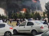 Flames and smoke rise after a fire broke out at a shopping center in Tehran, Iran, May 5, 2026, in this screen grab taken from social media video. SOCIAL MEDIA/via REUTERS  THIS IMAGE HAS BEEN SUPPLIED BY A THIRD PARTY. NO RESALES. NO ARCHIVES. NEWS