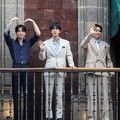 Members of South Korean Kpop boy band BTS and Mexico's President Claudia Sheinbaum react as they stand on a balcony of the National Palace ahead of a series of concerts on the BTS World Tour "Arirang" in Mexico City, Mexico, May 6, 2026. REUTERS/Luis