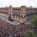 Fans of South Korean Kpop boy band BTS, known as ARMY, gather at Zocalo Square as they wait for members of the group alongside Mexico's President Claudia Sheinbaum to appear on a balcony of the National Palace, ahead of concerts on their "Arirang" wo