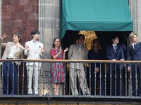 Mexico's President Claudia Sheinbaum and members of South Korean Kpop boy band BTS react as they stand on a balcony of the National Palace ahead of a series of concerts on the BTS World Tour "Arirang" in Mexico City, Mexico, May 6, 2026. REUTERS/Luis
