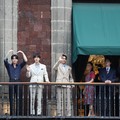 Mexico's President Claudia Sheinbaum and members of South Korean Kpop boy band BTS react as they stand on a balcony of the National Palace ahead of a series of concerts on the BTS World Tour "Arirang" in Mexico City, Mexico, May 6, 2026. REUTERS/Luis
