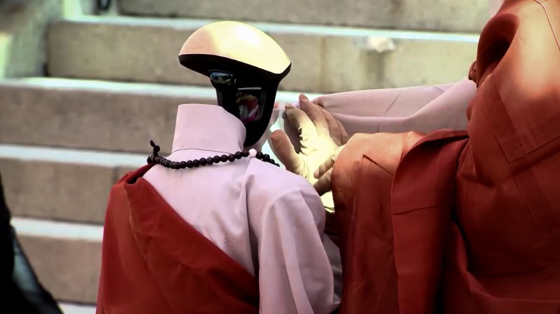 Humanoid robot Gabi folds its hands during a precept ceremony at a temple in Seoul, South Korea, May 6, 2026.    Yonhap via REUTERS   THIS IMAGE HAS BEEN SUPPLIED BY A THIRD PARTY. NO RESALES. NO ARCHIVES. SOUTH KOREA OUT. NO COMMERCIAL OR EDITORIAL SALES IN SOUTH KOREA.