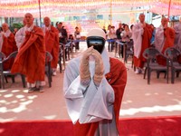 Humanoid robot Gabi folds its hands during a precept ceremony at a temple in Seoul, South Korea, May 6, 2026.    Yonhap via REUTERS   THIS IMAGE HAS BEEN SUPPLIED BY A THIRD PARTY. NO RESALES. NO ARCHIVES. SOUTH KOREA OUT. NO COMMERCIAL OR EDITORIAL
