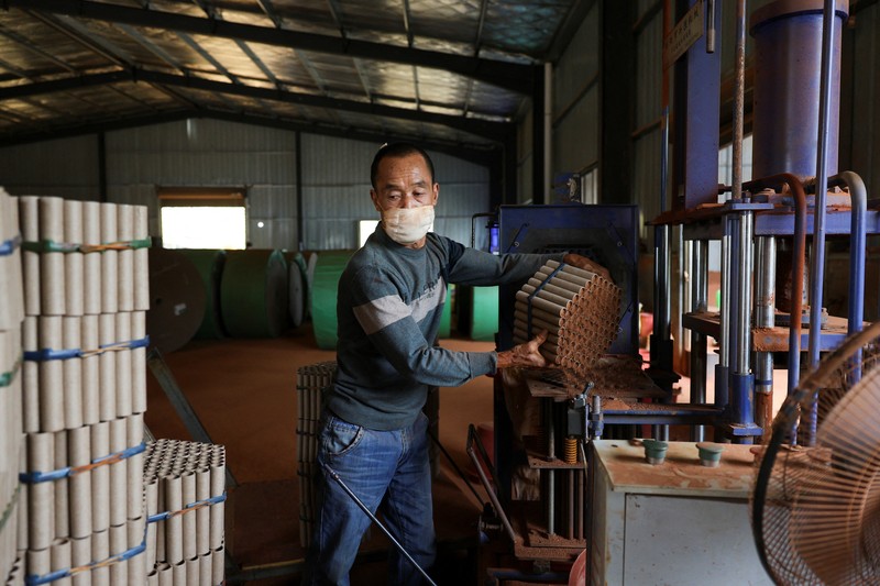 Employees work to assemble firework products at Chili Fireworks factory in Liling, Hunan province, China, April 10, 2026.  REUTERS/Go Nakamura