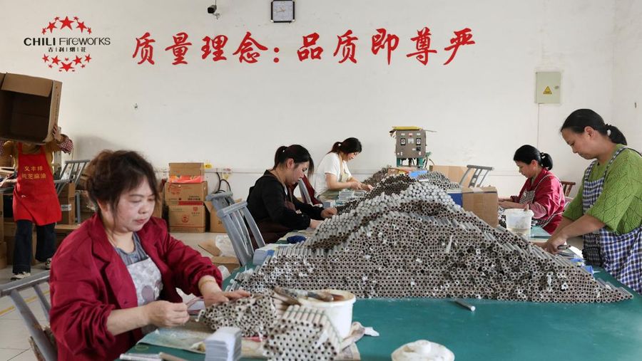 Employees work to assemble firework products at Chili Fireworks factory in Liling, Hunan province, China, April 10, 2026.  REUTERS/Go Nakamura