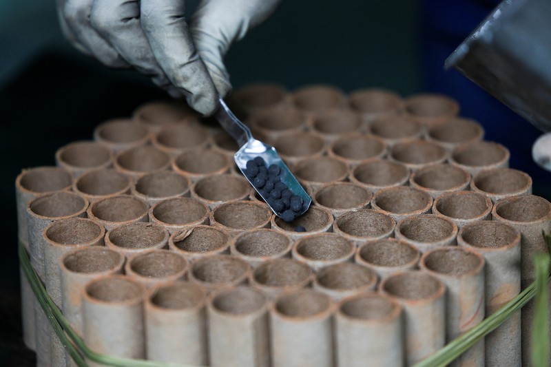 Employees work to assemble firework products at Chili Fireworks factory in Liling, Hunan province, China, April 10, 2026.  REUTERS/Go Nakamura