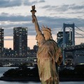 Ilustrasi Patung Liberty. (Photo by GREG BAKER / AFP)