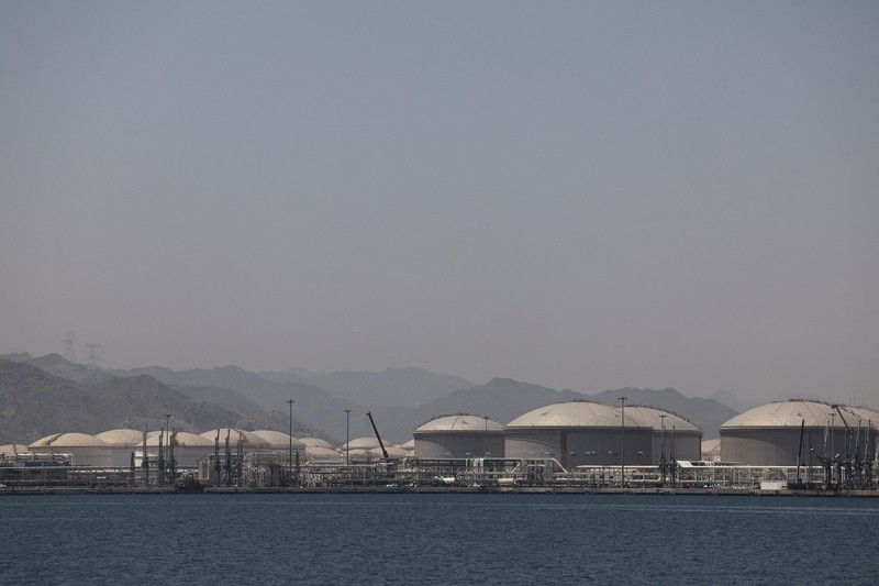 A man walks at the Port of Fujairah, as the U.S.-Israel conflict with Iran limits marine traffic in the Strait of Hormuz, in Fujairah, United Arab Emirates, May 6, 2026. REUTERS/Amr Alfiky