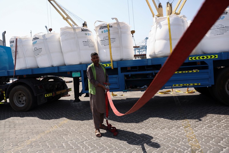 A man walks at the Port of Fujairah, as the U.S.-Israel conflict with Iran limits marine traffic in the Strait of Hormuz, in Fujairah, United Arab Emirates, May 6, 2026. REUTERS/Amr Alfiky