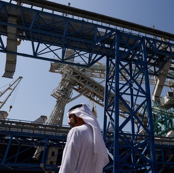 A man walks at the Port of Fujairah, as the U.S.-Israel conflict with Iran limits marine traffic in the Strait of Hormuz, in Fujairah, United Arab Emirates, May 6, 2026. REUTERS/Amr Alfiky