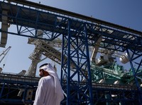 A man walks at the Port of Fujairah, as the U.S.-Israel conflict with Iran limits marine traffic in the Strait of Hormuz, in Fujairah, United Arab Emirates, May 6, 2026. REUTERS/Amr Alfiky