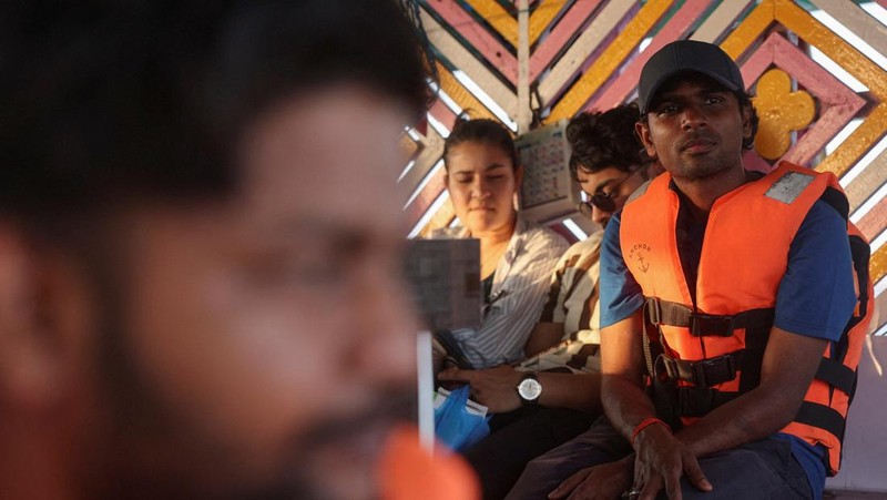 Tithi Chiranjeevi, an Indian seafarer who was stuck in Iran during the conflict, travels on a ferry in Mumbai, India, May 6, 2026. REUTERS/Francis Mascarenhas     TPX IMAGES OF THE DAY