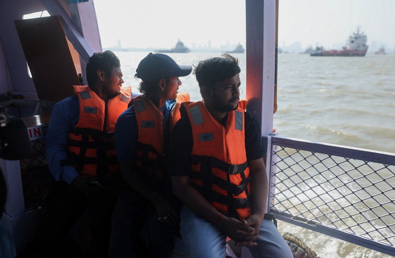 Tithi Chiranjeevi, an Indian seafarer who was stuck in Iran during the conflict, travels on a ferry in Mumbai, India, May 6, 2026. REUTERS/Francis Mascarenhas     TPX IMAGES OF THE DAY