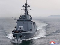 This picture taken on May 7, 2026 and released by North Korea's official Korean Central News Agency (KCNA) via KNS on May 8, 2026 shows North Korean leader Kim Jong Un and his daughter Kim Ju Ae inspecting the destroyer Choe Hyon as it undergoes a co