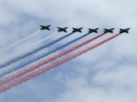 Russia's Su-25 jet aircraft release smoke in the colours of the Russian state flag during a flypast rehearsal for a military parade, which marks the 81st anniversary of victory over Nazi Germany in World War Two, in central Moscow, Russia, May 6, 202