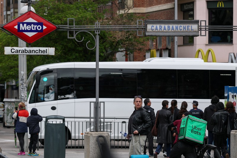 A bus carrying passengers of the cruise ship MV Hondius, which was affected by a hantavirus outbreak, at the Gomez Ulla Military Hospital, in Madrid, Spain, May 10, 2026. REUTERS/Alejandro Martinez Velez