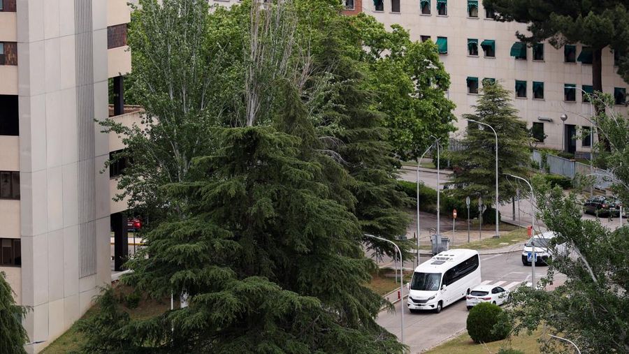 A bus carrying passengers of the cruise ship MV Hondius, which was affected by a hantavirus outbreak, at the Gomez Ulla Military Hospital, in Madrid, Spain, May 10, 2026. REUTERS/Alejandro Martinez Velez