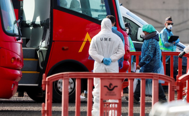 A Spanish coast guard boat operates next to cruise ship MV Hondius at the port of Granadilla de Abona after being affected by a hantavirus outbreak, in Tenerife, Spain, May 10, 2026. REUTERS/Hannah McKay