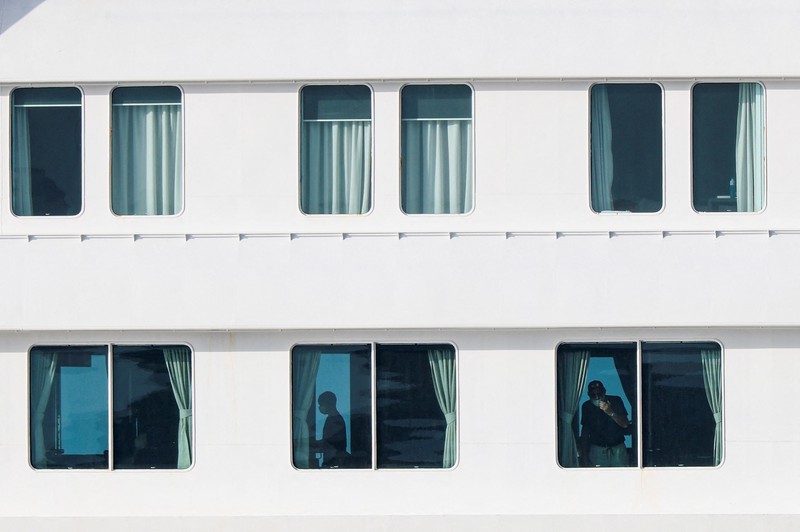 A Spanish coast guard boat operates next to cruise ship MV Hondius at the port of Granadilla de Abona after being affected by a hantavirus outbreak, in Tenerife, Spain, May 10, 2026. REUTERS/Hannah McKay