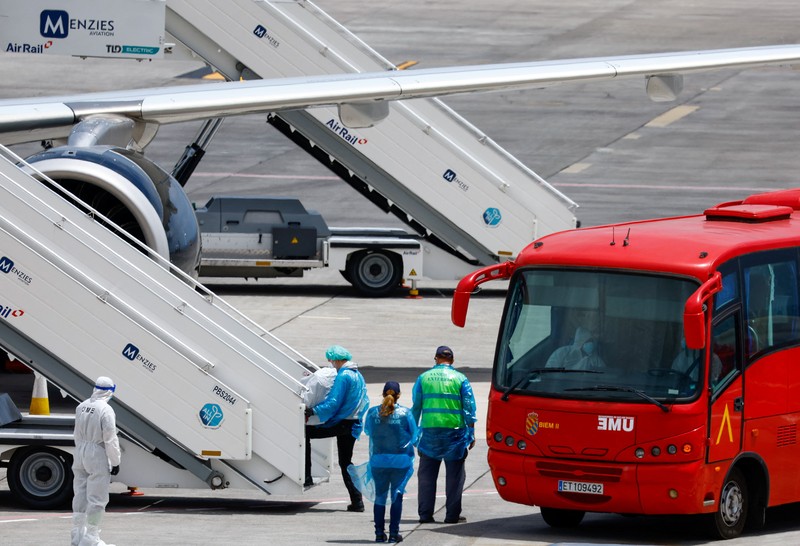 A bus carrying passengers of the cruise ship MV Hondius, which was affected by a hantavirus outbreak, at the Gomez Ulla Military Hospital, in Madrid, Spain, May 10, 2026. REUTERS/Alejandro Martinez Velez