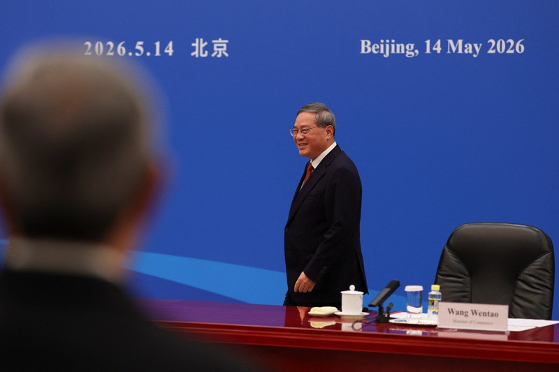 CEO Nvidia Jensen Huang, CEO Apple Tim Cook, dan CEO Citi Jane Fraser tiba untuk pertemuan antara Perdana Menteri China Li Qiang dan perwakilan bisnis AS, di Balai Besar Rakyat di Beijing, China, 14 Mei 2026. (REUTERS/Go Nakamura/Pool)