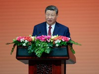 Presiden China Xi Jinping berbicara pada jamuan makan malam kenegaraan bersama Presiden AS Donald Trump (tidak terlihat dalam foto) di Balai Besar Rakyat di Beijing, China, 14 Mei 2026. (REUTERS/Evan Vucci)
