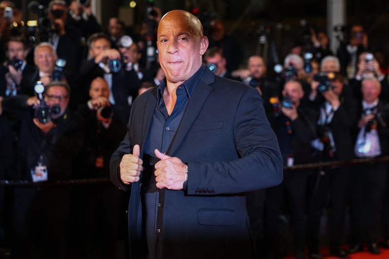 Jordana Brewster, Michelle Rodriguez, dan Vin Diesel berpose di karpet merah untuk pemutaran film
