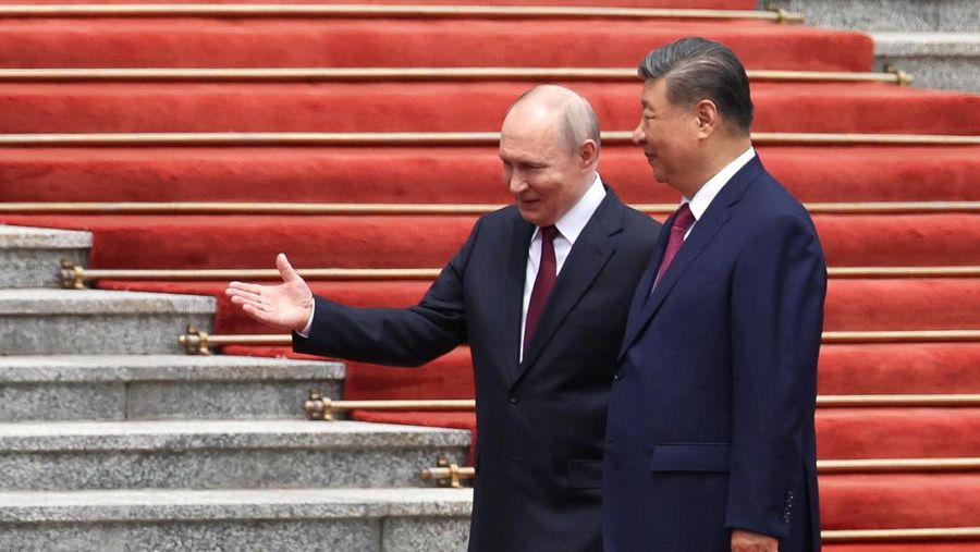 Presiden China Xi Jinping dan Presiden Rusia di Balai Besar Rakyat di Beijing, China, Rabu (20/5/2026). (REUTERS/Maxim Shemetov/Pool)