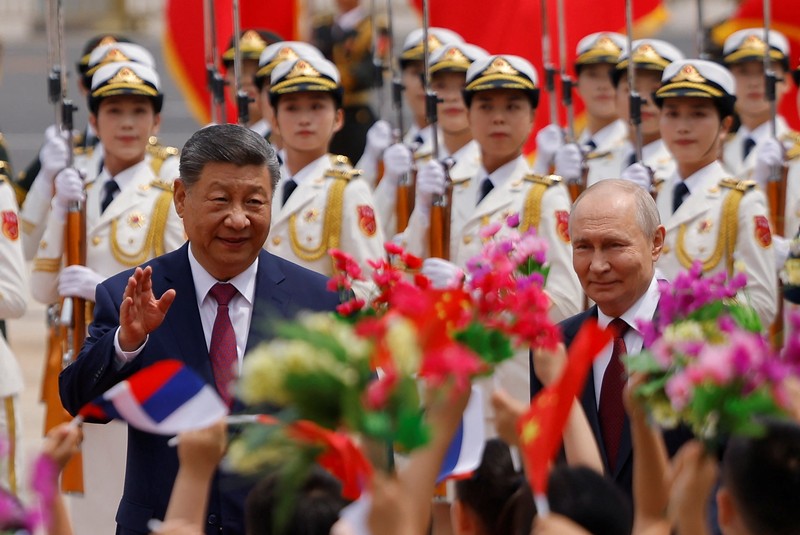 Presiden China Xi Jinping dan Presiden Rusia di Balai Besar Rakyat di Beijing, China, Rabu (20/5/2026). (Sputnik/Maxim Stulov/Pool via REUTERS)