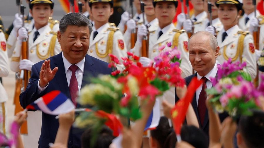 Presiden China Xi Jinping dan Presiden Rusia di Balai Besar Rakyat di Beijing, China, Rabu (20/5/2026). (REUTERS/Maxim Shemetov/Pool)
