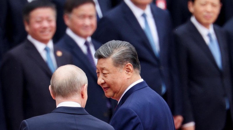 Presiden China Xi Jinping dan Presiden Rusia di Balai Besar Rakyat di Beijing, China, Rabu (20/5/2026). (REUTERS/Maxim Shemetov/Pool)