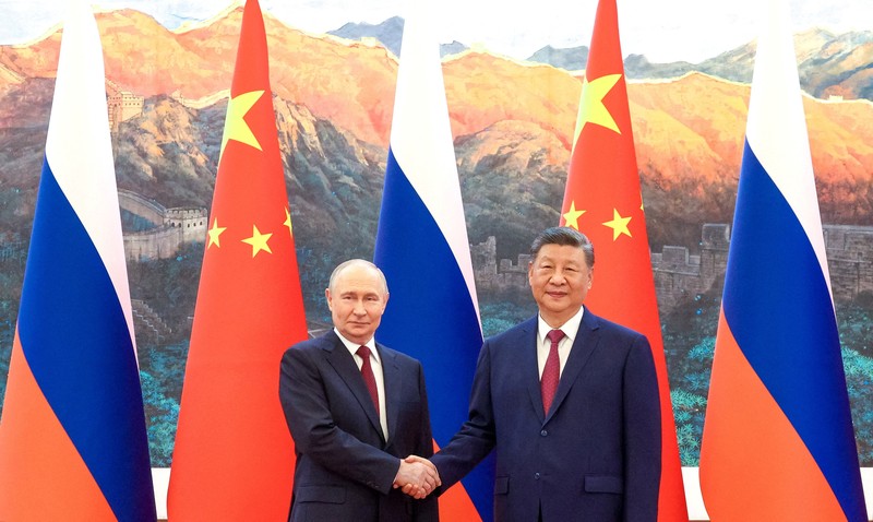 Presiden China Xi Jinping dan Presiden Rusia di Balai Besar Rakyat di Beijing, China, Rabu (20/5/2026). (Sputnik/Maxim Stulov/Pool via REUTERS)
