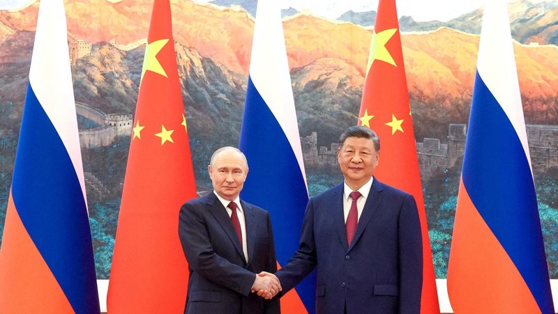 Presiden China Xi Jinping dan Presiden Rusia di Balai Besar Rakyat di Beijing, China, Rabu (20/5/2026). (Sputnik/Maxim Stulov/Pool via REUTERS)