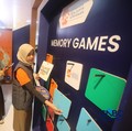 Keseruan booth Lembaga Penjamin Simpanan (LPS) dalam acara Jogja Financial Festival 2026 di Jogja Expo Center (JEC), Yogyakarta, Jawa Tengah, Jumat (22/5/2026). (CNBC Indonesia/Faisal Rahman)