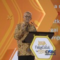 Ketua Dewan Komisioner LPS, Anggito Abimanyu saat menyampaikan sambutan dalam Jogja Financial Festival 2026 di Jogja Expo Center (JEC), Yogyakarta, Jumat (22/5/2026). (CNBC Indonesia/Faisal Rahman)