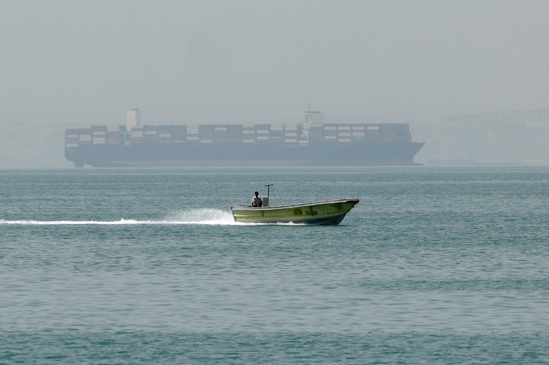 Korps Garda Revolusi Islam Iran (IRGC) mengumumkan bahwa sedikitnya 31 kapal komersial, telah melintasi Selat Hormuz secara aman dalam 24 jam terakhir, Jumat (22/5/2026). (via REUTERS/Majid-Asgaripour)
