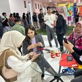 Sejumlah peserta mengunjungi booth Bank Negara Indonesia (BNI) dalam Jogja Financial Festival 2026.