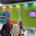 Sejumlah peserta mengunjungi booth Bank Negara Indonesia (BNI) dalam Jogja Financial Festival 2026 di Jogja Expo Center (JEC), Yogyakarta, DIY, Jumat (22/5/2026). (CNBC Indonesia/Elga Nurmutia)