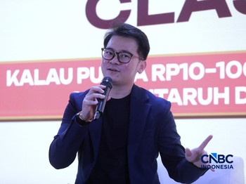 Stock Enthusiast, Michael Yeoh saat menyampaikan pemaparan dalam sesi Educational Class di acara Jogja Financial Festival 2026 di Jogja Expo Center (JEC), Yogyakarta, Jawa Tengah, Jumat (22/5/2026). (CNBC Indonesia/Muhammad Sabki)