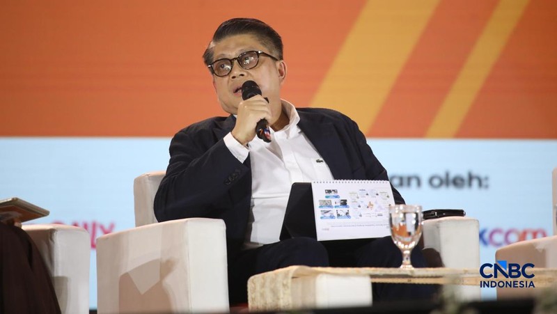 Direktur Treasury & International Banking - PT Bank Negara Indonesia (Persero) Tbk, Abu Santosa Sudradjat saat menyampaikan pemaparan dalam Jogja Financial Festival 2026 di Jogja Expo Center (JEC), Yogyakarta, DIY, Sabtu (23/5/2026). (CNBC Indonesia/