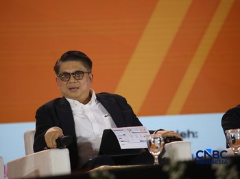 Direktur Treasury & International Banking - PT Bank Negara Indonesia (Persero) Tbk, Abu Santosa Sudradjat saat menyampaikan pemaparan dalam Jogja Financial Festival 2026 di Jogja Expo Center (JEC), Yogyakarta, DIY, Sabtu (23/5/2026). (CNBC Indonesia/