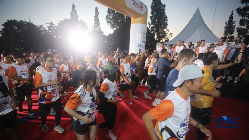 Peserta Jogja Run D-City (JRDC) 2026 yang menjadi bagian dari Jogja Financial Festival di Universitas Gadjah Mada, Yogyakarta, Minggu (24/5/2026) pagi. (CNBC Indonesia/Faisal Rahman)